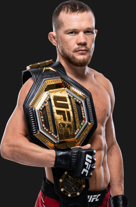 Пётр Ян с чемпионским поясом UFC в легчайшем весе